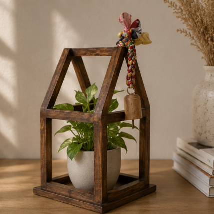 Plant House With Braided Sari and Antique Bell