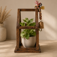 Plant House With Braided Sari and Antique Bell